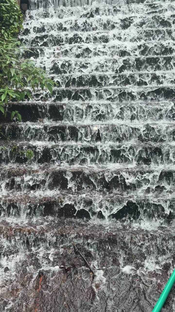 Water flowing over stone steps near Chikmagalur
